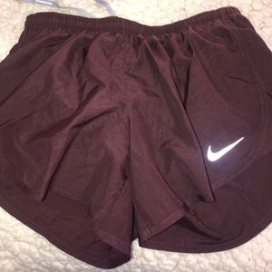 Red Nike athletic shorts